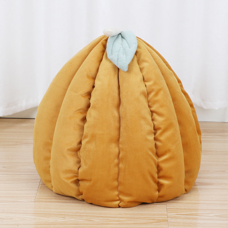 Golden pumpkin cat bed with leaf detail